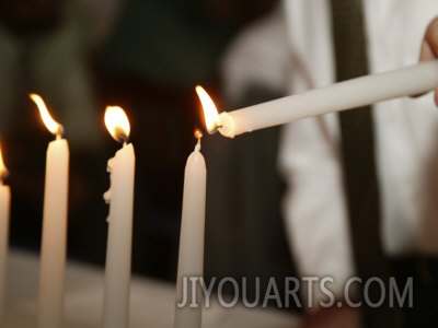 bill keefrey boy lighting candles at bar mitzvah