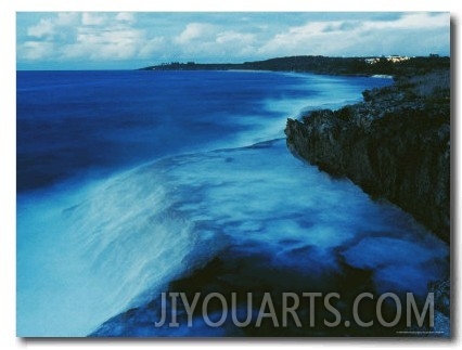 Waves Crash against a Reef