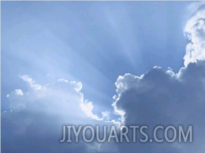 Sky with Rays of Sun and Clouds