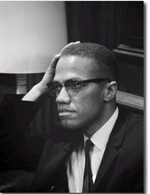 Malcolm X waits at Martin Luther King Press Conference, 1964