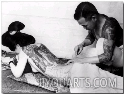 An Unidentified Japanese Tattoo Artist Works on a Woman