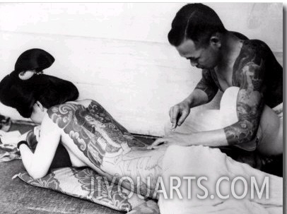 An Unidentified Japanese Tattoo Artist Works on a Woman