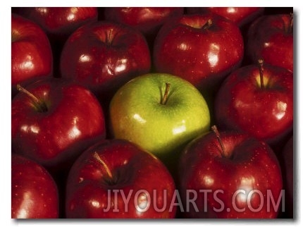 Green Apple Among Red Apples