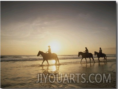 Horseback Riders Silhouetted on a Beach at Twilight, Costa Rica