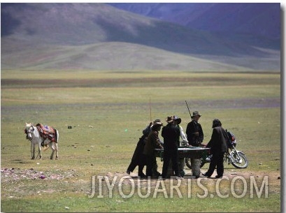 Tibetan Men Play Pool