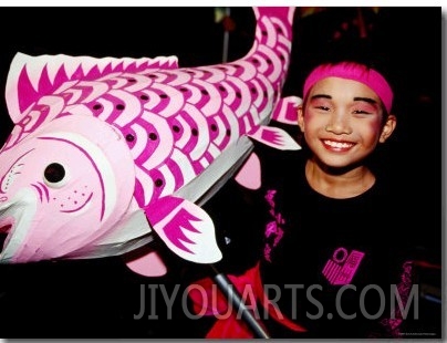 Boy with Fish at Chingay Chinese New Year Party, Singapore