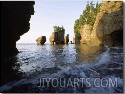 The Tide Flows Past Rock Formations in Rocks Provincial Park, Bay of Fundy, New Brunswick, Canada