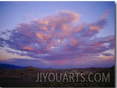 Storm Clouds Gather above a New Mexican Town