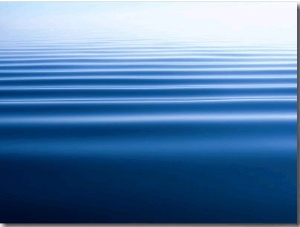 Small Gentle Ripples Move Across the Calm Surface of the Arctic Ocean