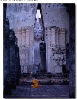 Monks Meditating in Front of Large Buddha Statue at Wat Si Chum, Sukhothai, Thailand