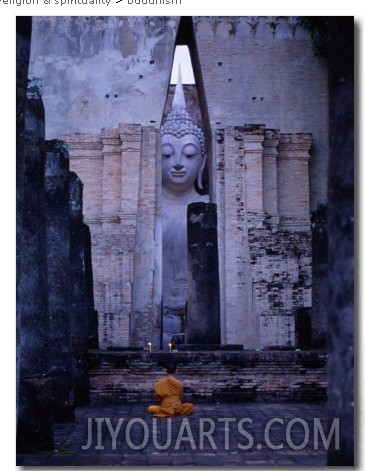 Monks Meditating in Front of Large Buddha Statue at Wat Si Chum, Sukhothai, Thailand