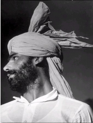 Close Up of a Young Sikh Man Sporting a Militant Looking Turban