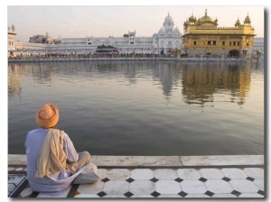 Sikh Pilgrim in Open Window of Hari Mandir in Golden Temple Complex, Amritsar, Punjab, India
