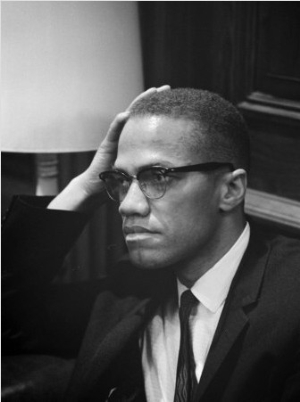 Malcolm X waits at Martin Luther King Press Conference, 1964