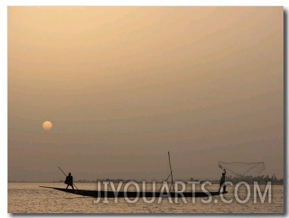 Men Fishing from a Boat at Sunset on the Niger River