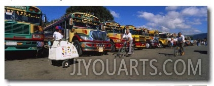 Buses Standing in a Row at a Bus Station, Antigua, Guatemala