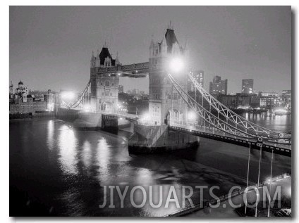 A View of Tower Bridge on the River Thames Illuminated at Night in London, April 1987