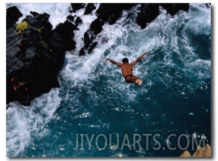 Clavadista (Cliff Diver) Jumping into Canal, Acapulco, Guerrero, Mexico