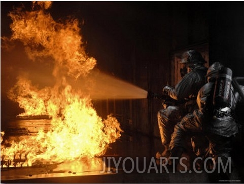 Firefighters Extinguishing a Simulated Battery Fire