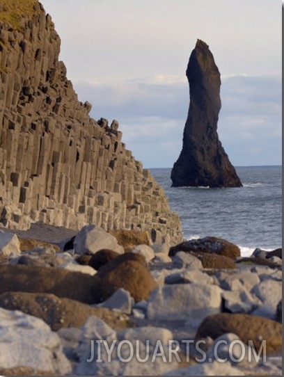 Columnar Basalt Cliffs and Reynisdrangar Sea Stack Standing in the Sea, Near Vik