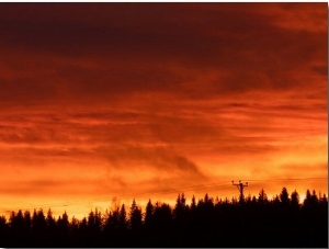 Fiery Red and Orange Sunset Illuminating the Night Sky