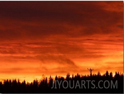 Fiery Red and Orange Sunset Illuminating the Night Sky