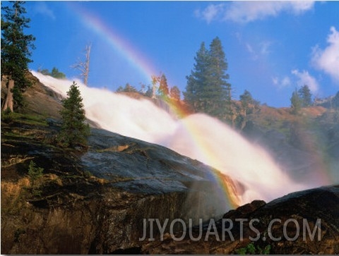 Rainbow Appears over Toulumne River as Mist Flows Down Waterwheel Falls