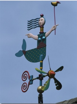 A Colorful Mermaid Shaped Weather Vane