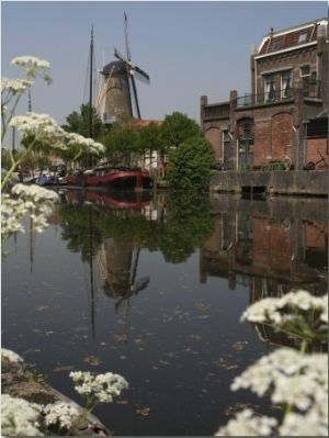 Dutch City Scene with Windmill Reflected in the Water