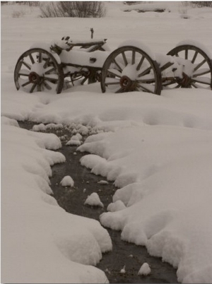 Old Wooden Wagon Abandoned in the Snow