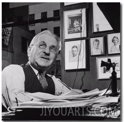 Albert Kahn Sitting at a Desk