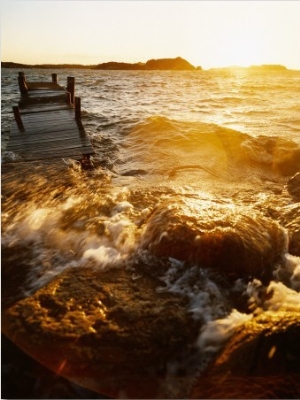 High Tide, Sea Flowing over a Jetty and Some Rocks