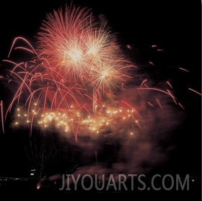 Display of Elaborate and Celebratory Fireworks in Night Sky