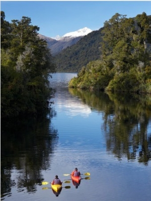 Kayaks, Moeraki River by Lake Moeraki, West Coast, South Island, New Zealand