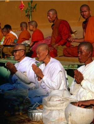 Nuns Praying at Pha That Luang Temple During the Full Moon Temple Festival, Vientiane, Laos