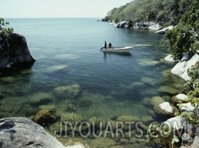 A Small Motorboat in a Lake Malawi Cove