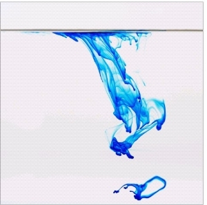 Blue dye floating in water